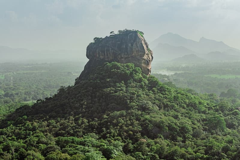 Sigiriya Rock Fortress in morning mist